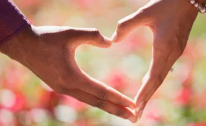 Fingers making a love heart shape - Relationship must-haves