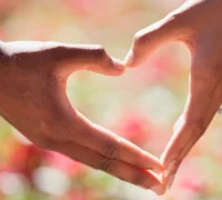 Fingers making a love heart shape - Relationship must-haves